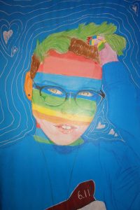 Bild. Ein expressives Portrait in sehr bunten Farben und modernen Formen