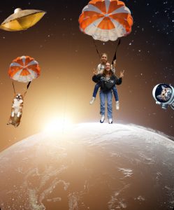 Zwei Mädchen mit Fallschirm im Weltall