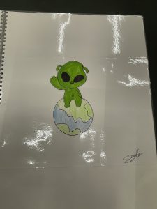 Skizze Alien sitzt auf Weltkugel
